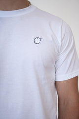 A close up image of cosycore by beCosy plain white short sleeve tshirt showing off the embroidered cat logo
